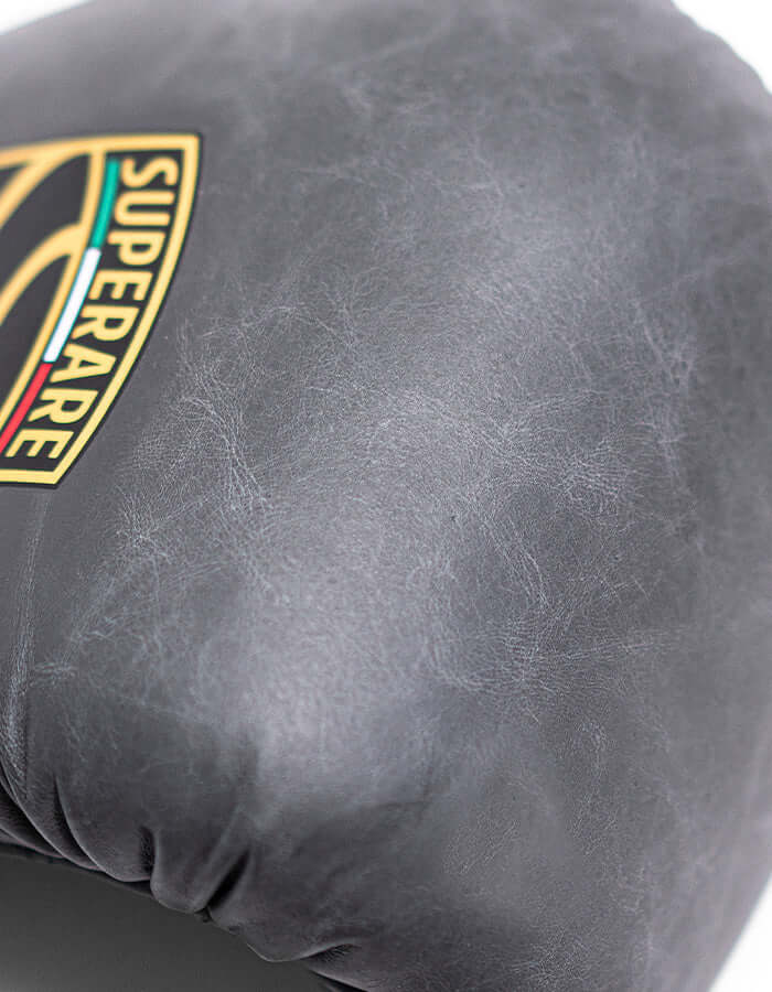 Close-up of Superare S50 Pietra Grey boxing gloves showcasing premium Italian leather craftsmanship.