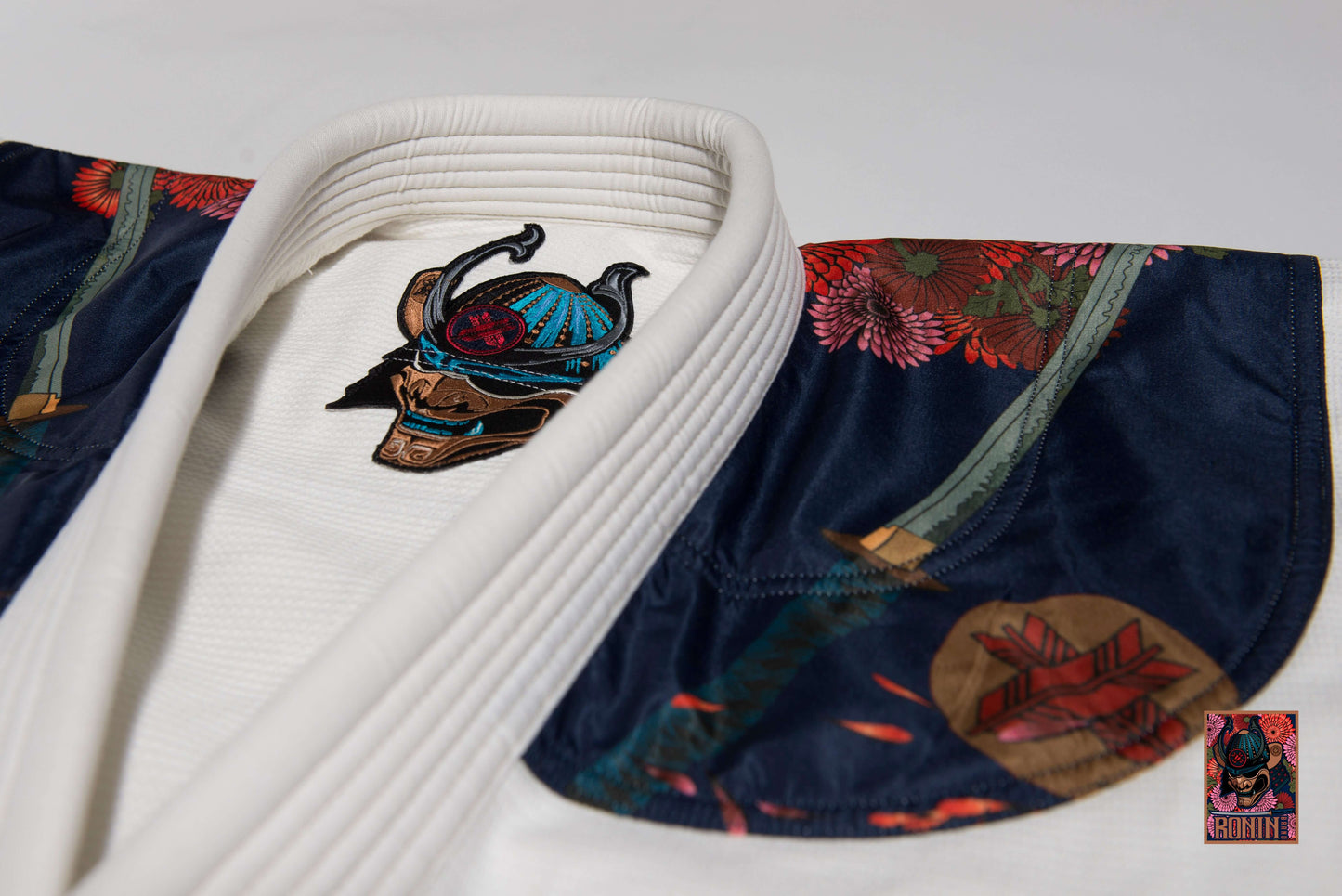 Roninbrand Emperor BJJ Gi white with detailed embroidery, designed for comfort and performance in Brazilian Jiu Jitsu.