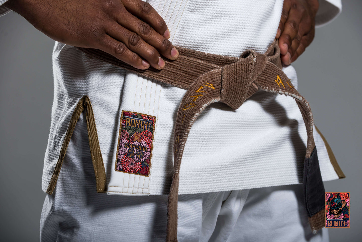 Roninbrand Emperor BJJ Gi in white with brown belt, designed for comfort and performance in Brazilian Jiu Jitsu.