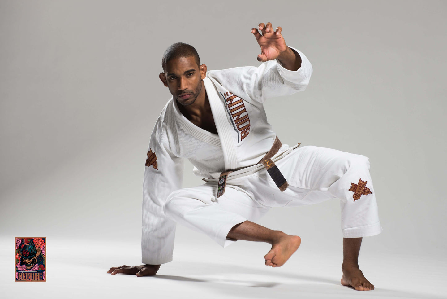Roninbrand Emperor BJJ Gi in white, showcasing grappling techniques and comfort for Brazilian Jiu Jitsu practitioners.