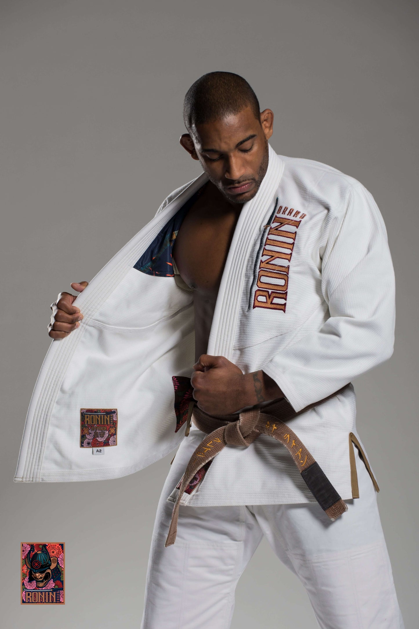 Roninbrand Emperor BJJ Gi in white worn by a martial artist showcasing comfort and style for Brazilian Jiu Jitsu.
