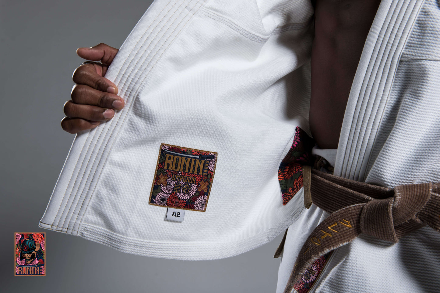 Roninbrand Emperor BJJ Gi white with embroidered logo inside collar, designed for optimal comfort and grappling performance.