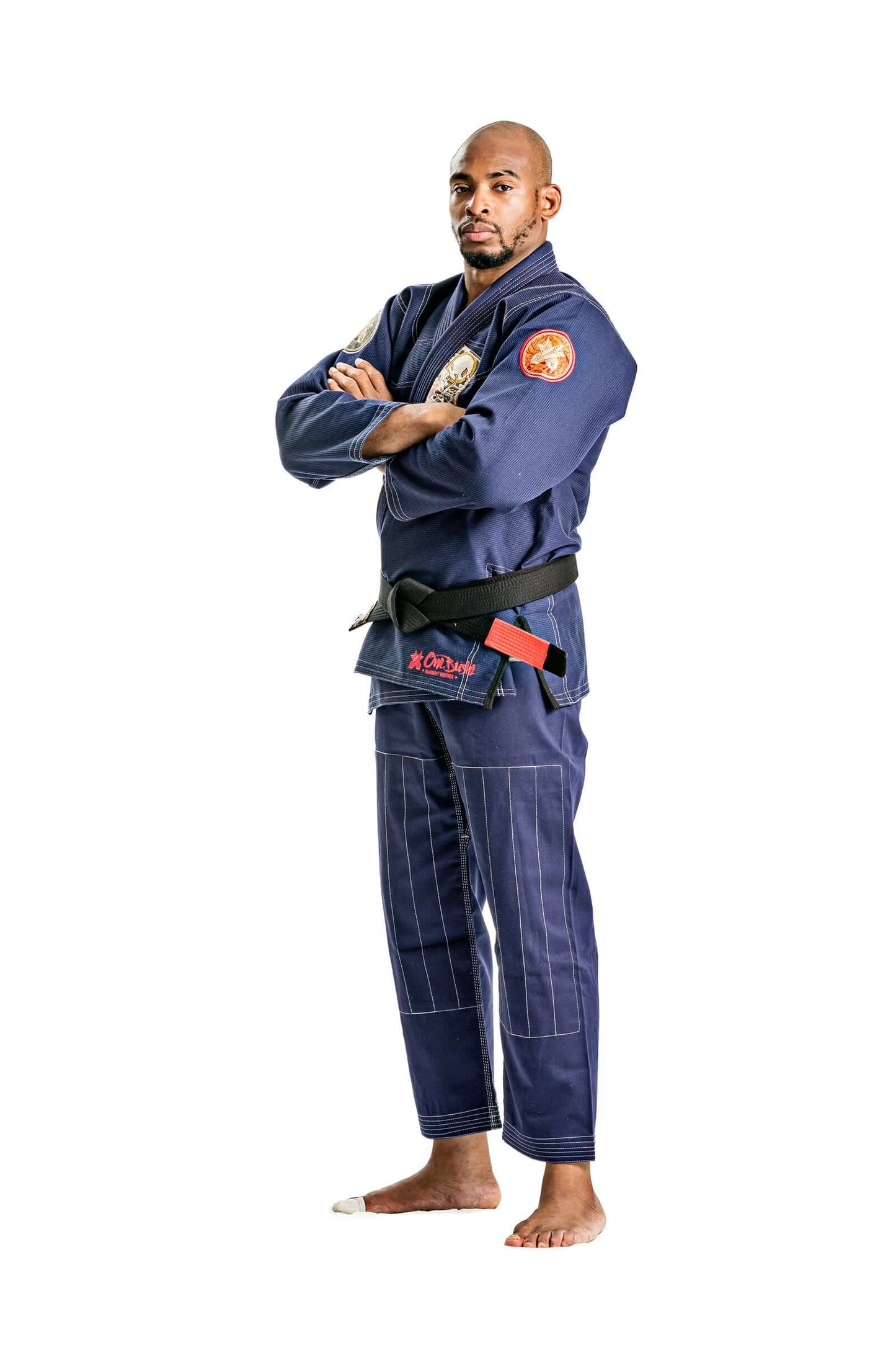 Man wearing Navy Roninbrand Oni Bushi BJJ Gi, showcasing style and fit for Brazilian Jiu Jitsu.