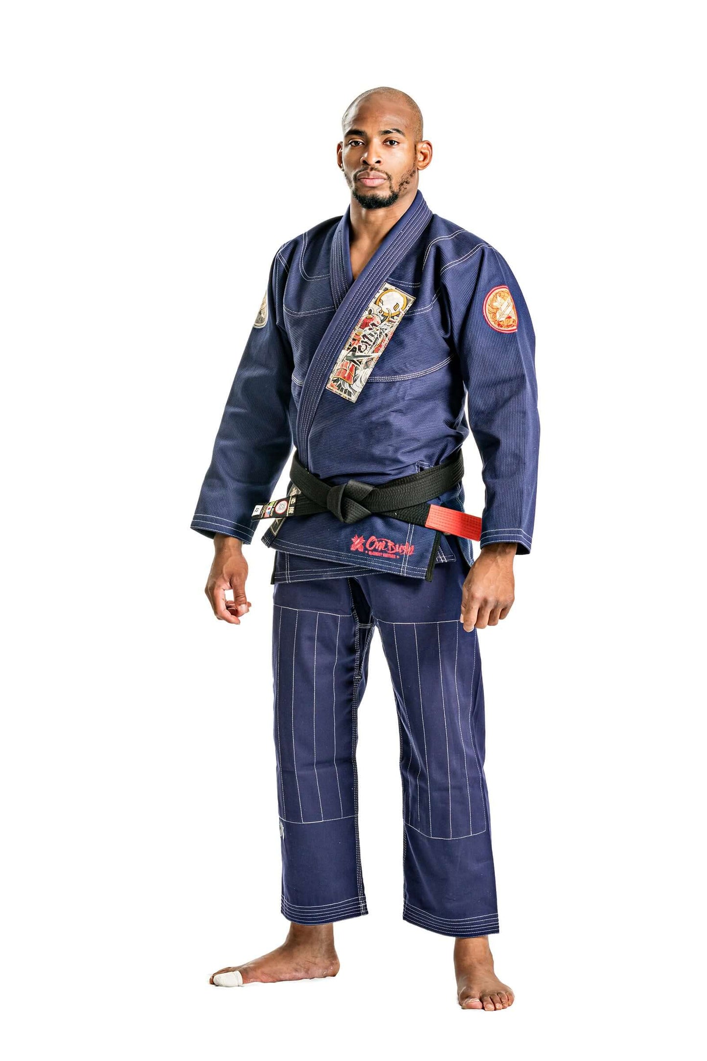 Roninbrand Oni Bushi Navy BJJ Gi on male model showcasing professional fit and comfort for elite fighters.