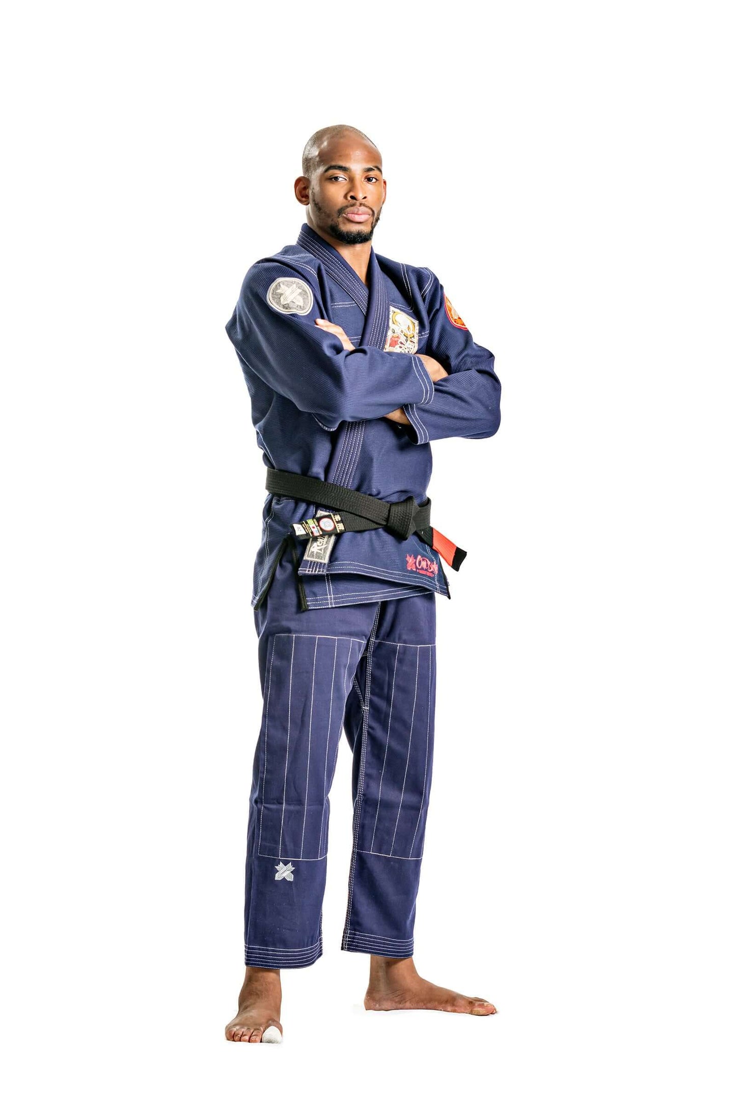 Roninbrand Oni Bushi Navy BJJ Gi displayed by a fighter showcasing strength and style, ideal for Brazilian Jiu Jitsu practice.