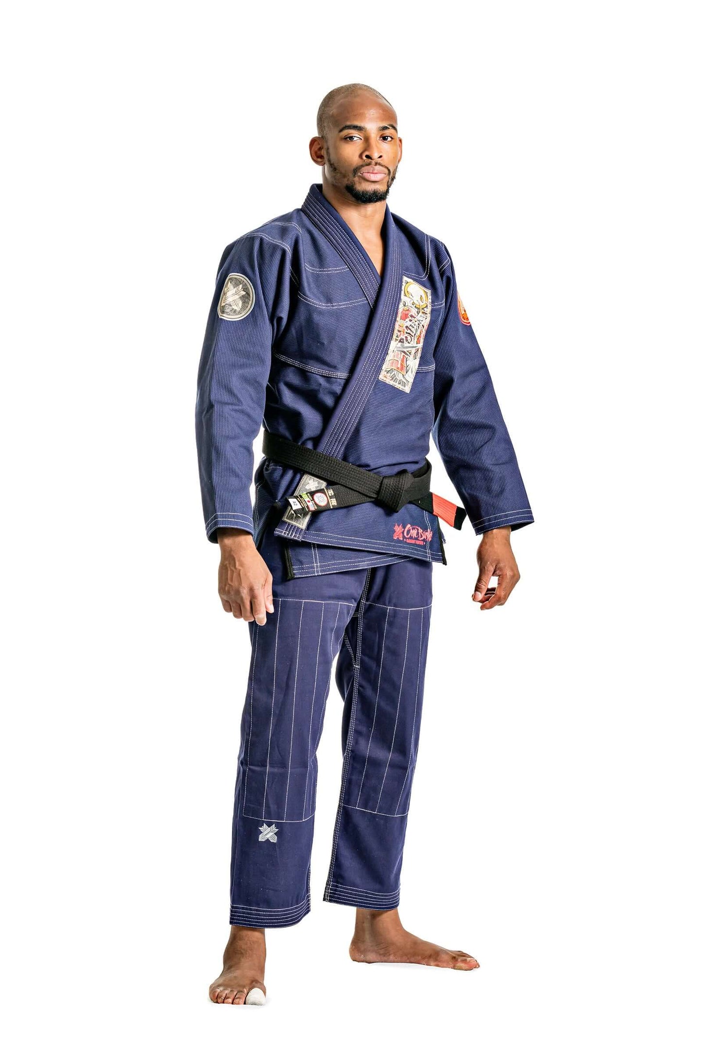 Roninbrand Oni Bushi Navy BJJ Gi on a male fighter, designed for durability and comfort, perfect for Brazilian Jiu Jitsu.
