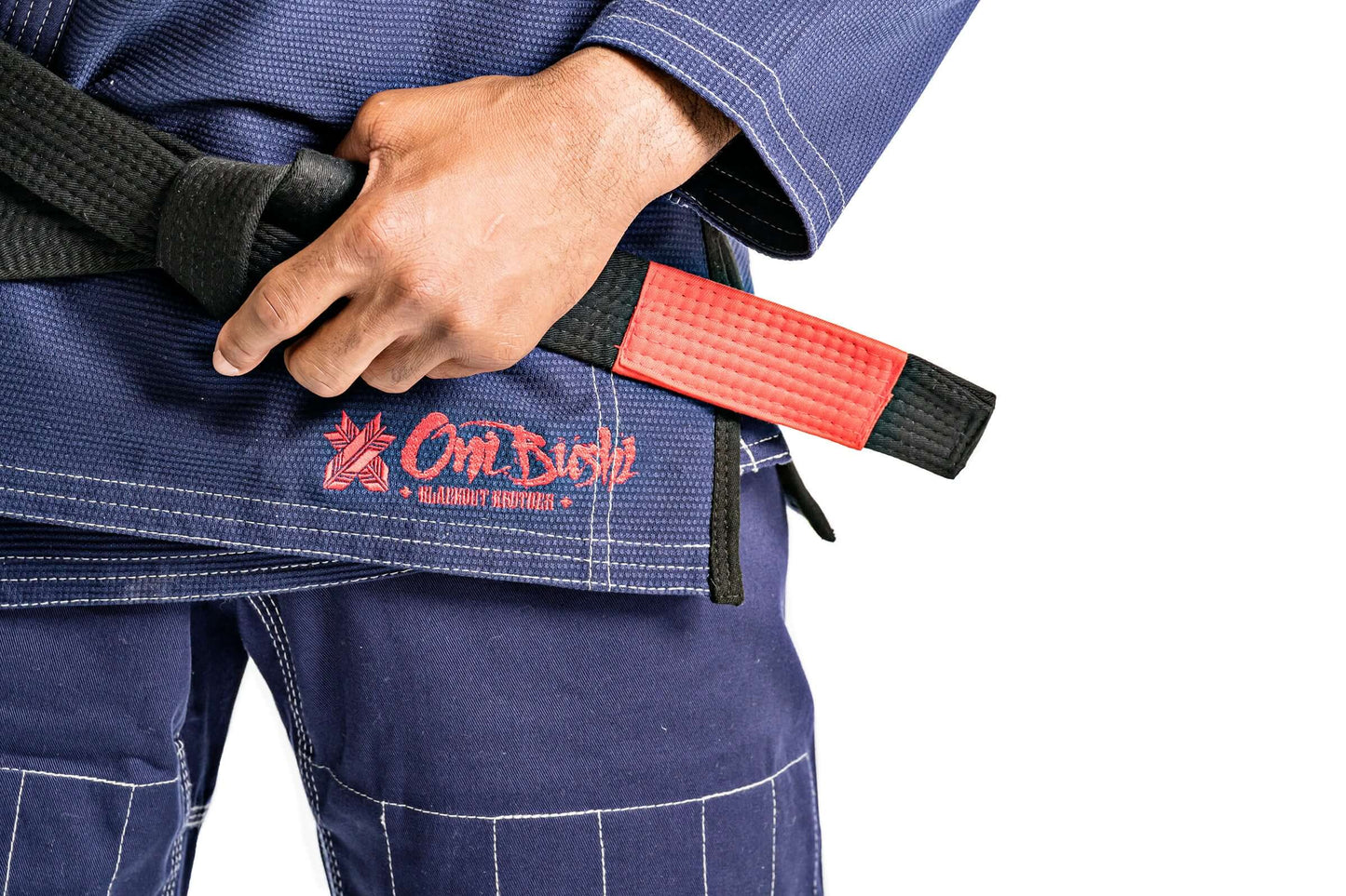 Roninbrand Oni Bushi BJJ Gi in navy with red and black belt, designed for elite Brazilian Jiu Jitsu performance.