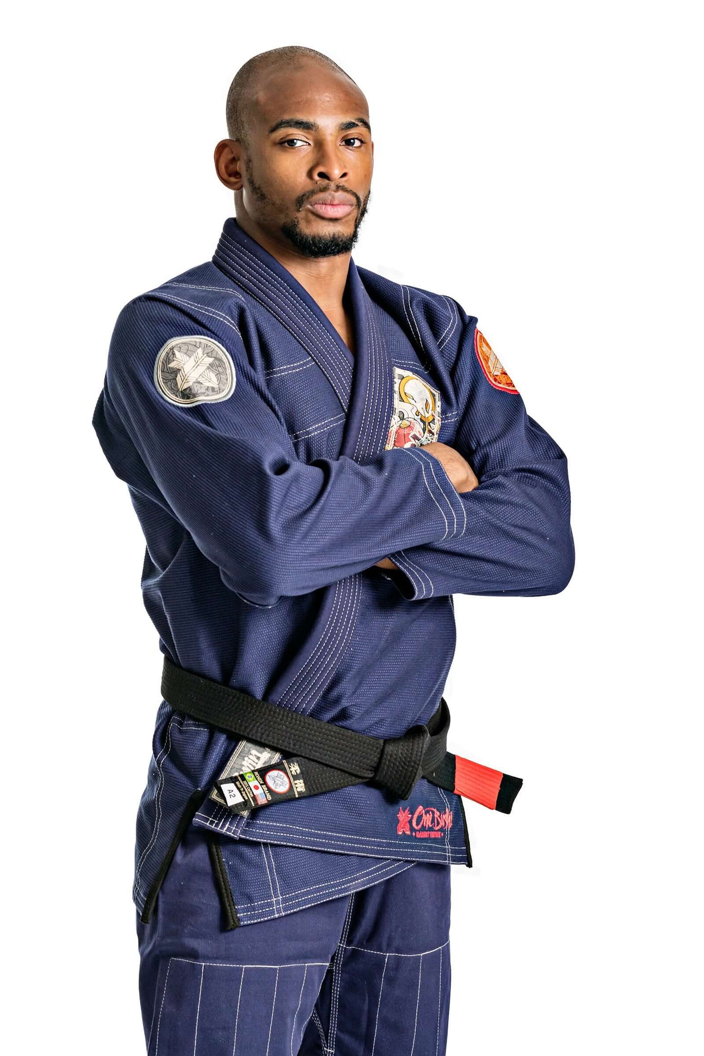 Roninbrand Oni Bushi BJJ Gi in navy, showcasing a fighter in action-ready attire, tailored for Brazilian Jiu Jitsu training.