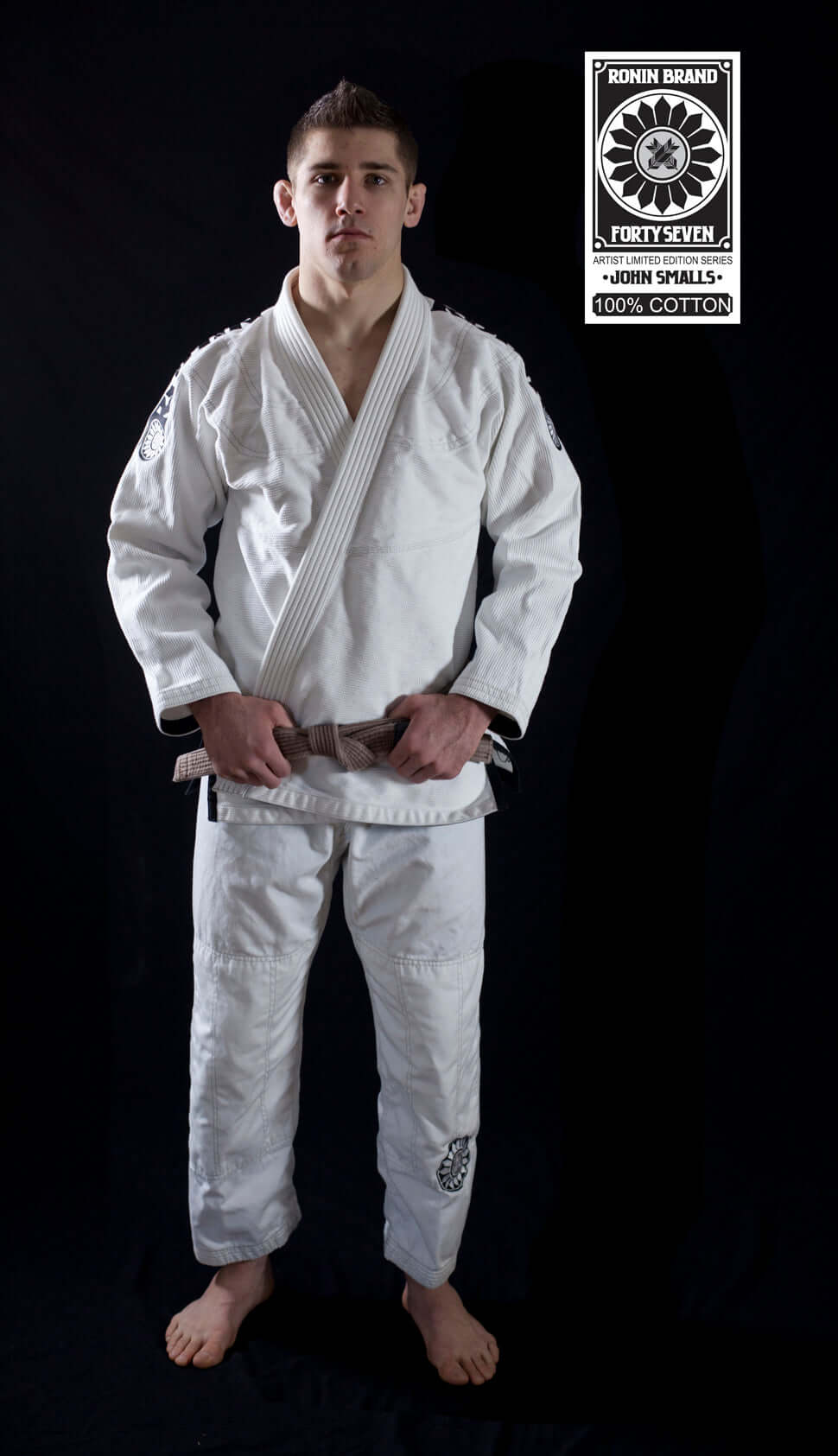 Male model wearing Roninbrand 47 BJJ Gi in white, showcasing comfort and fit for Brazilian Jiu Jitsu.