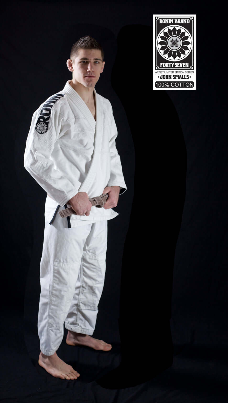 Roninbrand 47 BJJ Gi in white worn by a male model, showcasing ultimate comfort for Brazilian Jiu-Jitsu fighters.