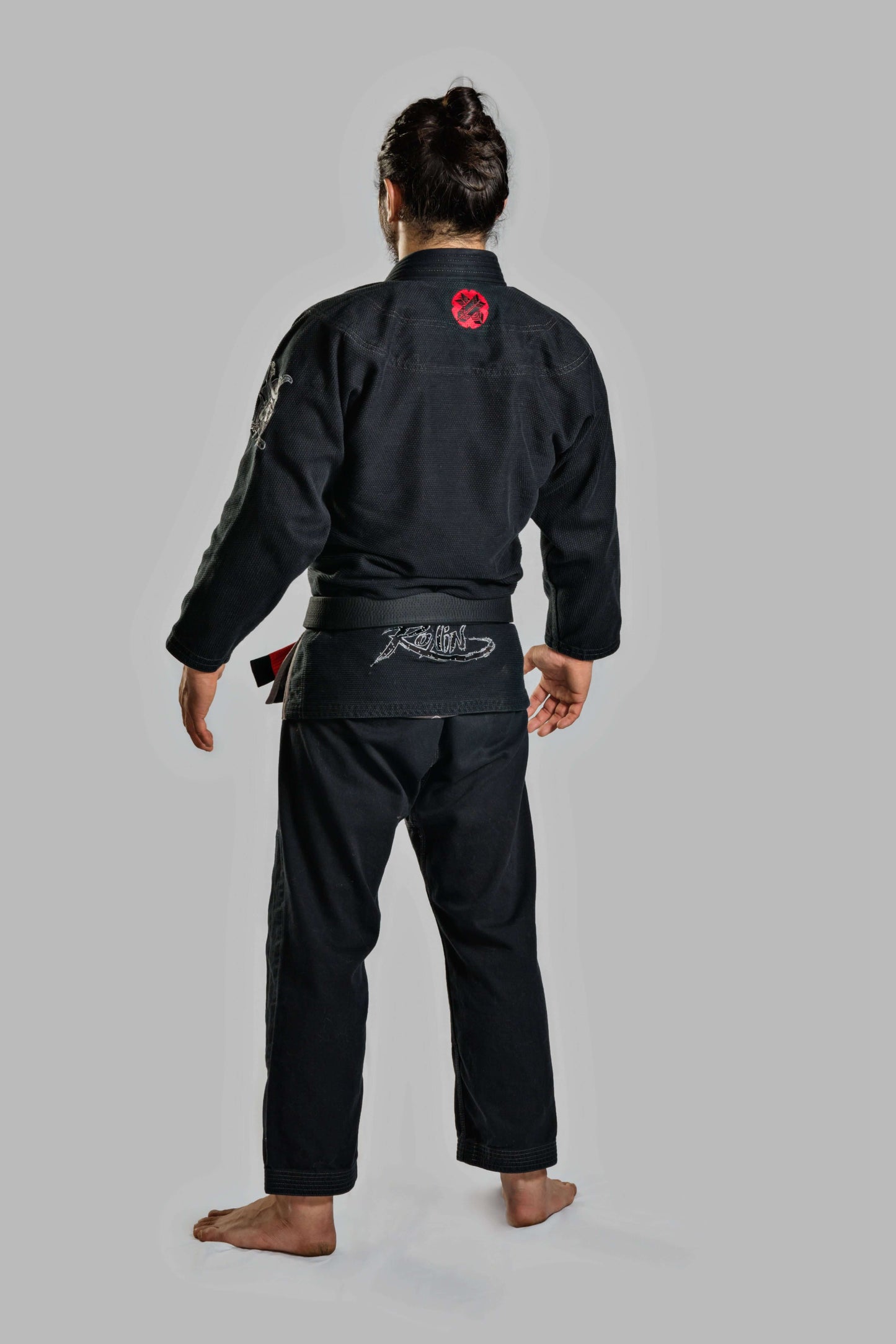 Back view of a fighter wearing the Roninbrand Samurai Ghost BJJ Gi in Black, showcasing premium design and fit.