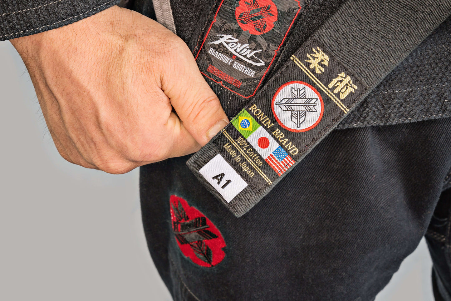 Close-up of Roninbrand Samurai Ghost BJJ Gi featuring labels and patches for professional fighters' comfort and fit.