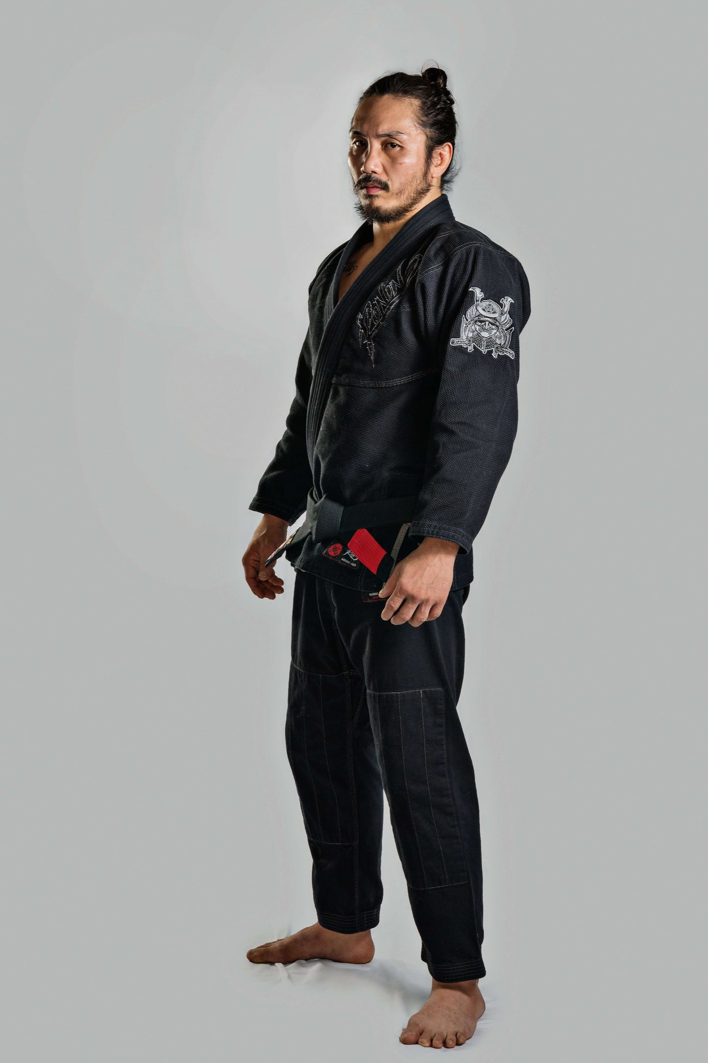 Roninbrand Samurai Ghost Black BJJ Gi worn by a fighter, showcasing professional Brazilian Jiu Jitsu gear for optimal comfort.