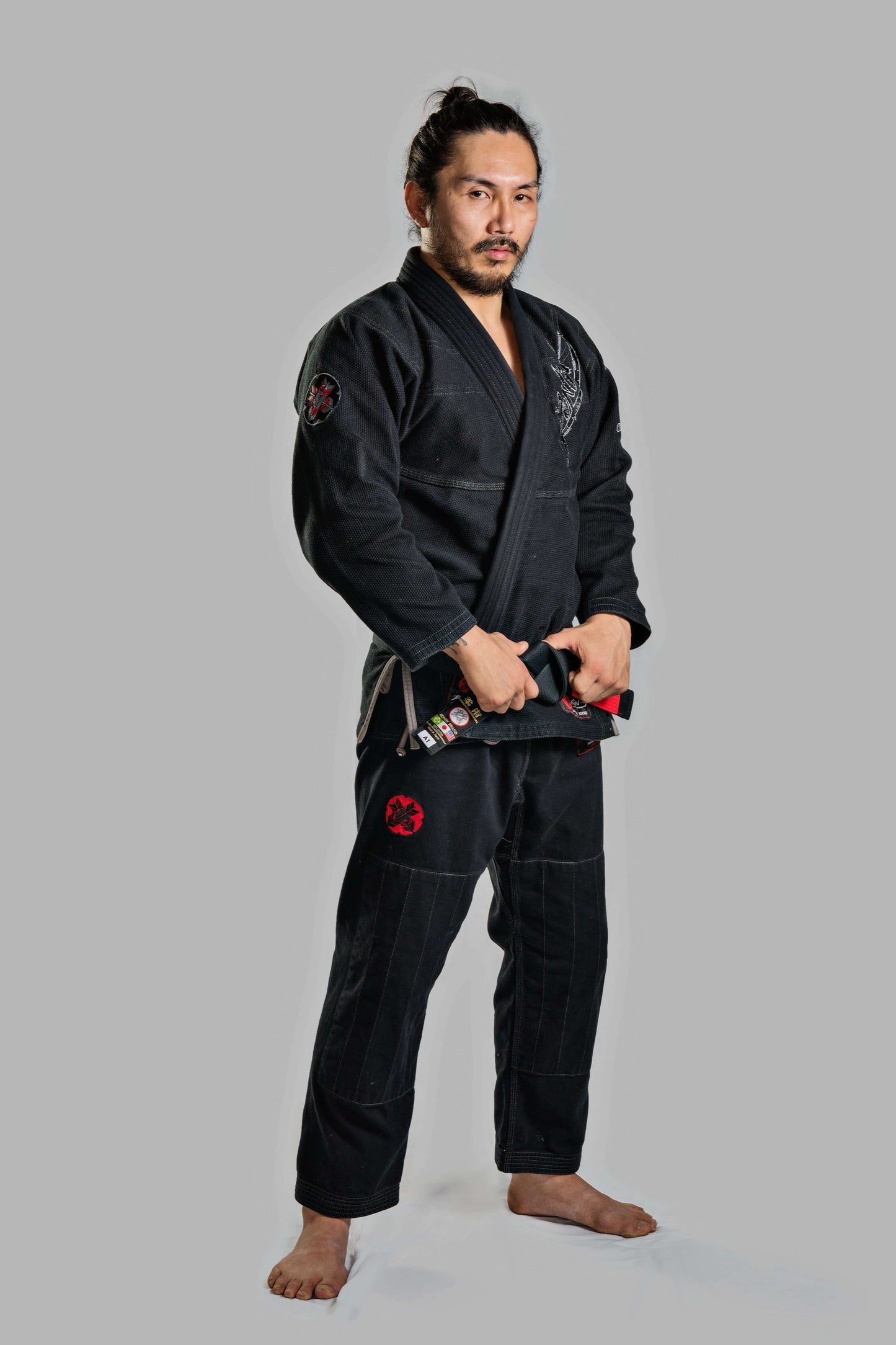 Roninbrand Samurai Ghost BJJ Gi in black worn by martial artist, designed for ultimate comfort and fit for fighters.