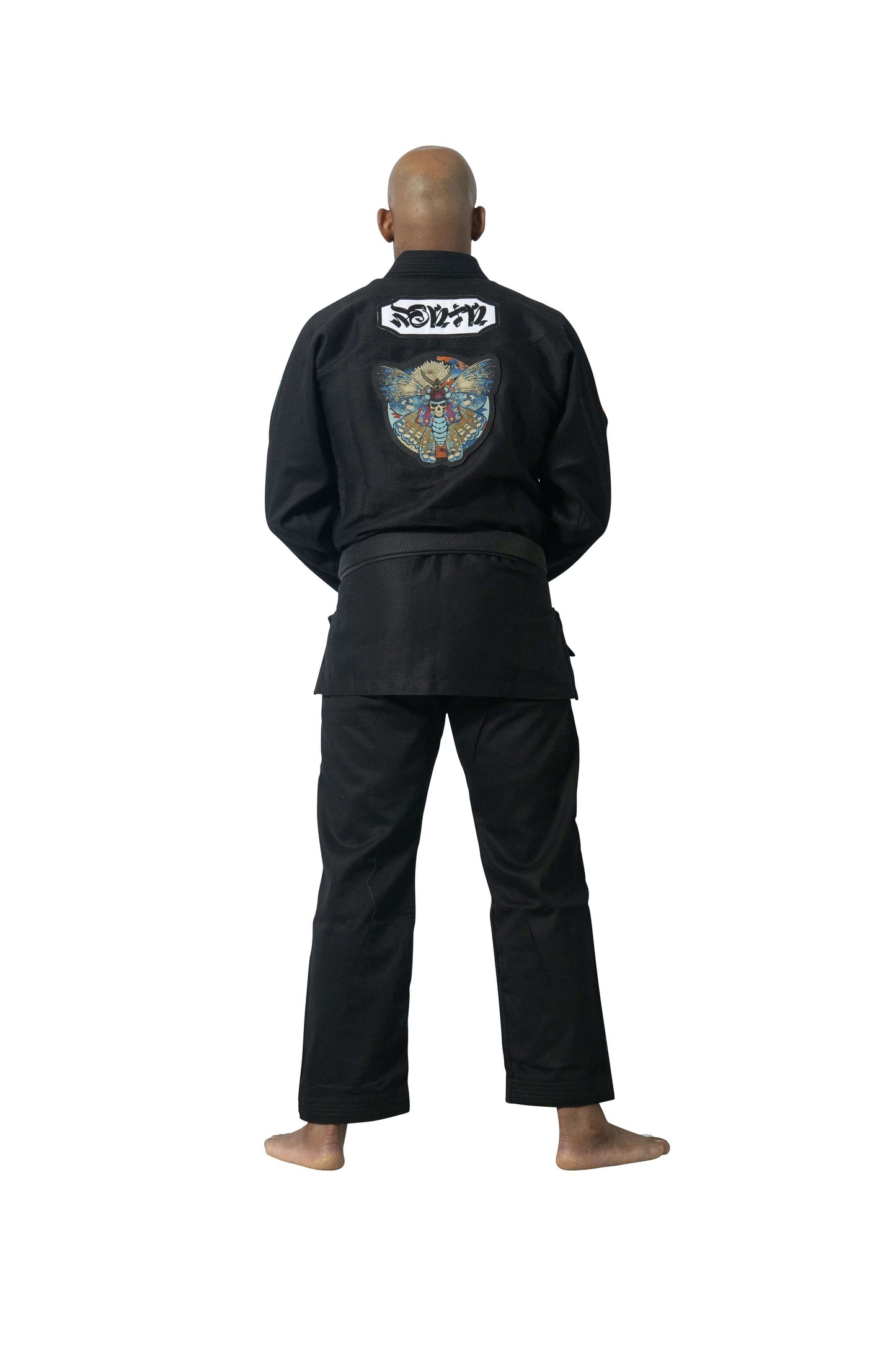 Roninbrand Shinsei Yūgure BJJ Gi in black, featuring a colorful embroidered logo, perfect for grappling and Jiu Jitsu.