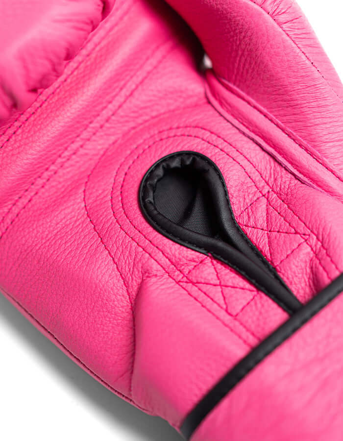 Detail of Superare S50 Rosa Boxing Gloves in blush pink, showcasing handmade Italian leather craftsmanship.