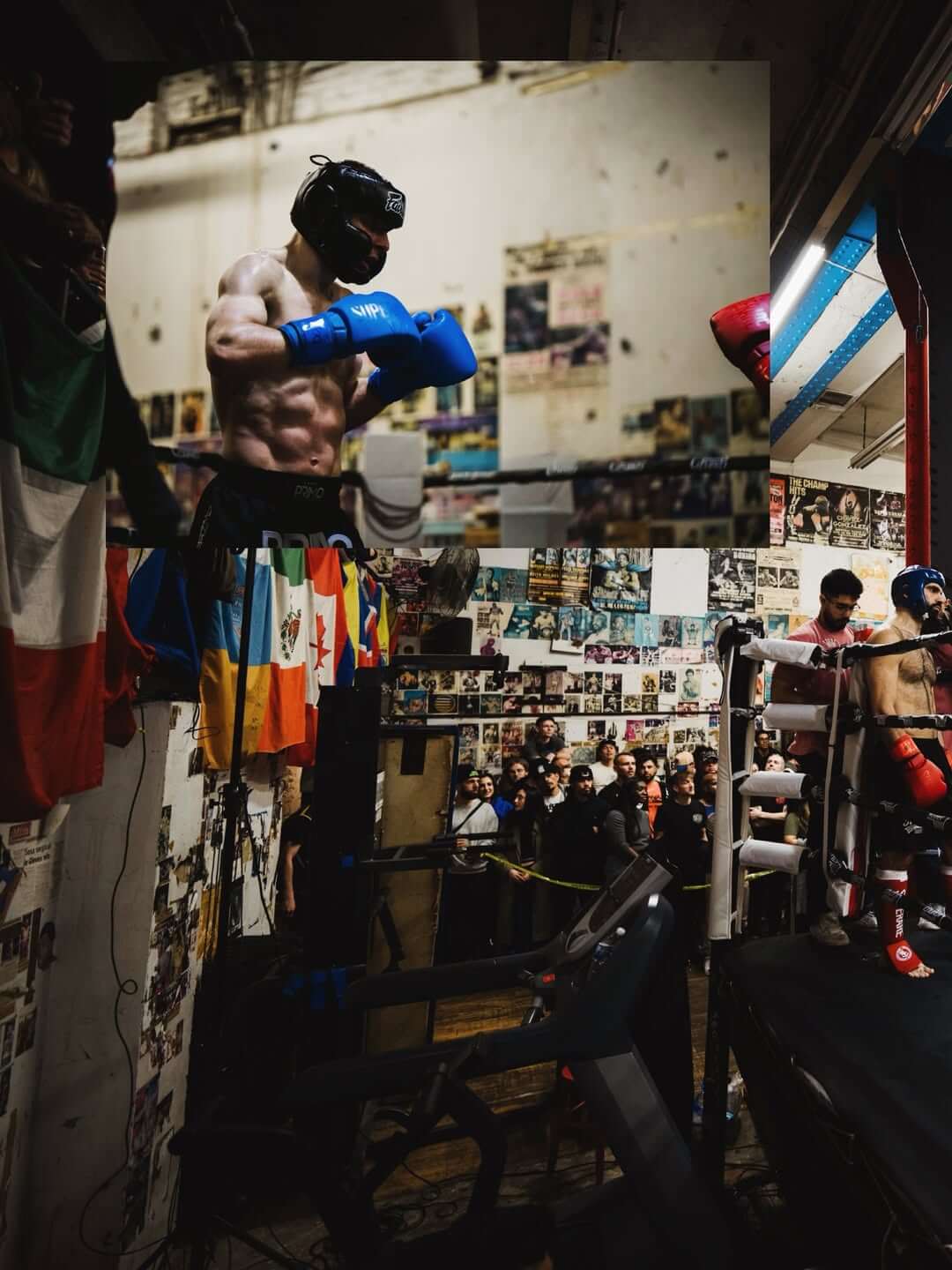 Boxing training session in a gym with a boxer in gloves and headgear, surrounded by boxing memorabilia.