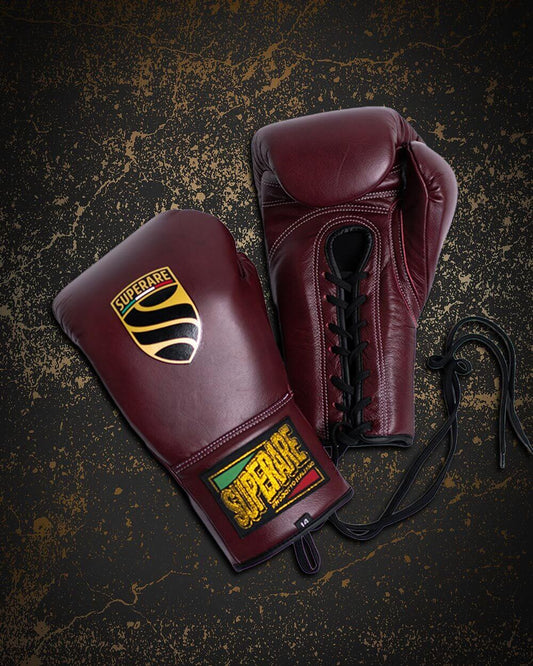 fight gear featuring maroon boxing gloves with branding, perfect for champions in the ring.