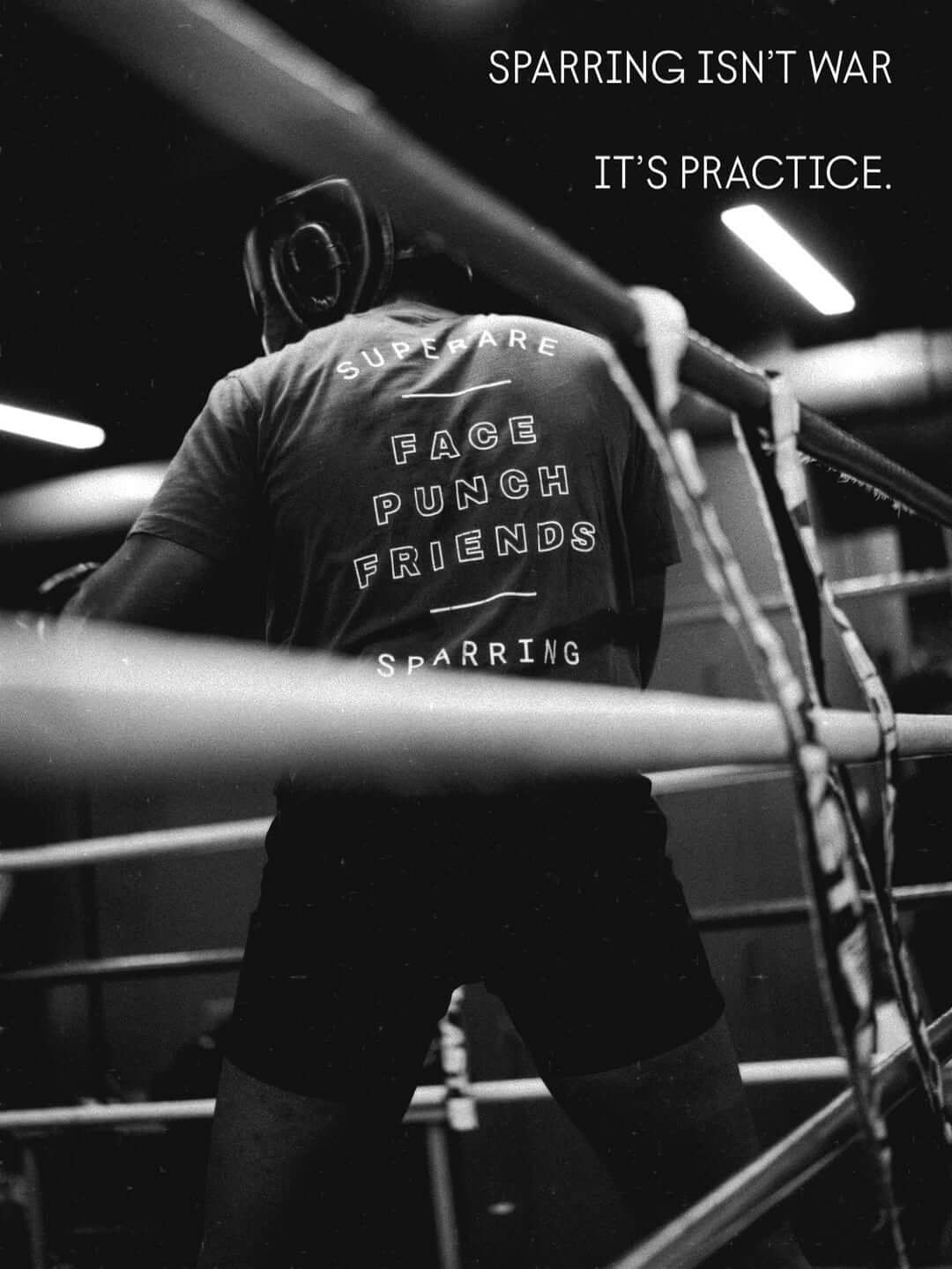 BoxingGloves on a fighter during sparring practice in a boxing ring.