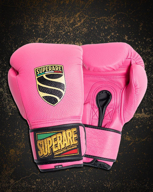 Boxing pink gloves by Superare - Paragon Elite Fight displayed on a textured background.