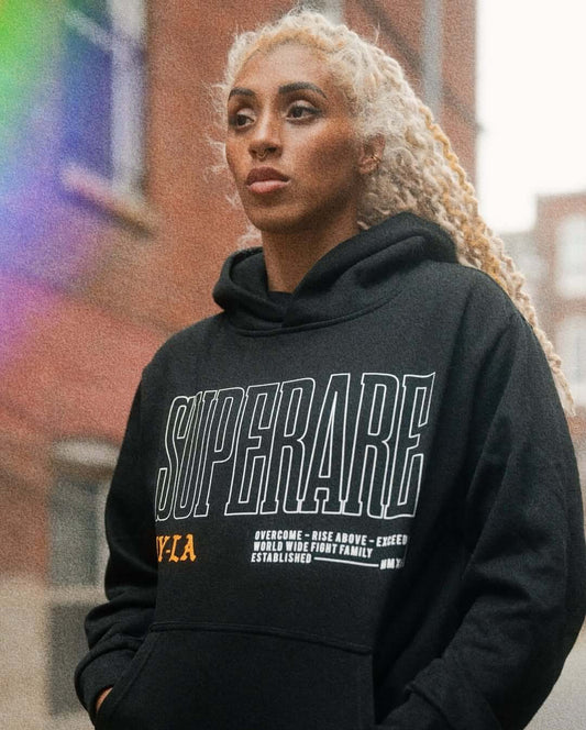 Paragon Elite Fight fighter with the text 'SUPERARE' outdoors in an urban setting.