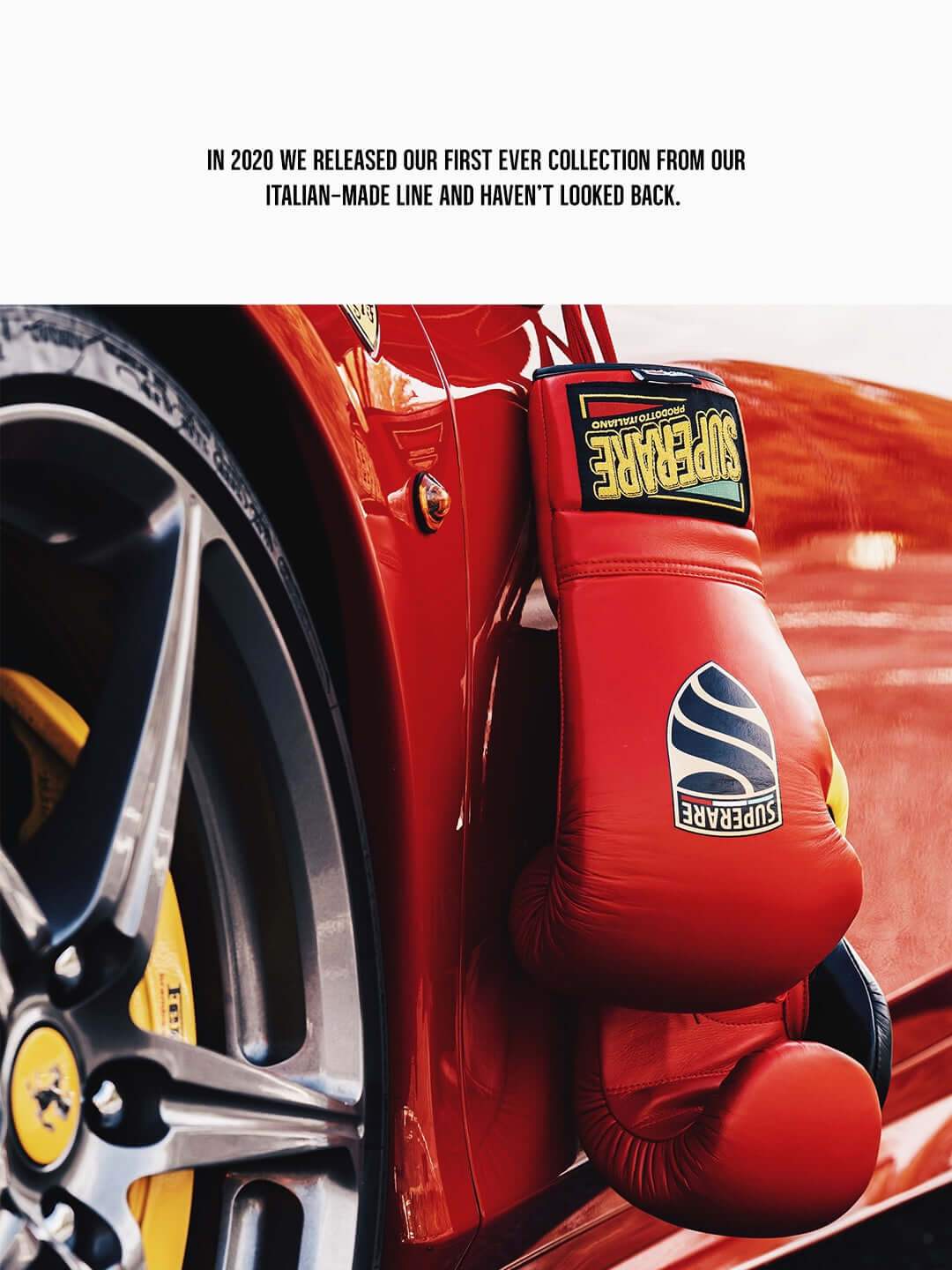 Fight Gear featuring a pair of red boxing gloves hanging from a luxury car.