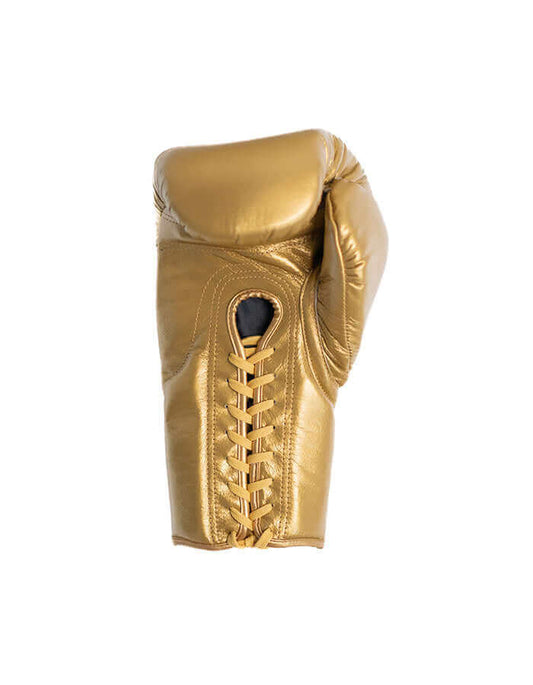 Gold boxing glove showcasing advanced materials and traditional craftsmanship.