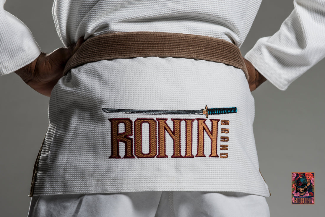 Martialarts Ronin Brand training gi with detailed logo on the back, ideal for MMA and BJJ practice.