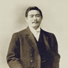 Historical figure in formal attire related to Martial Arts, showcasing the significance of tradition in combat sports.