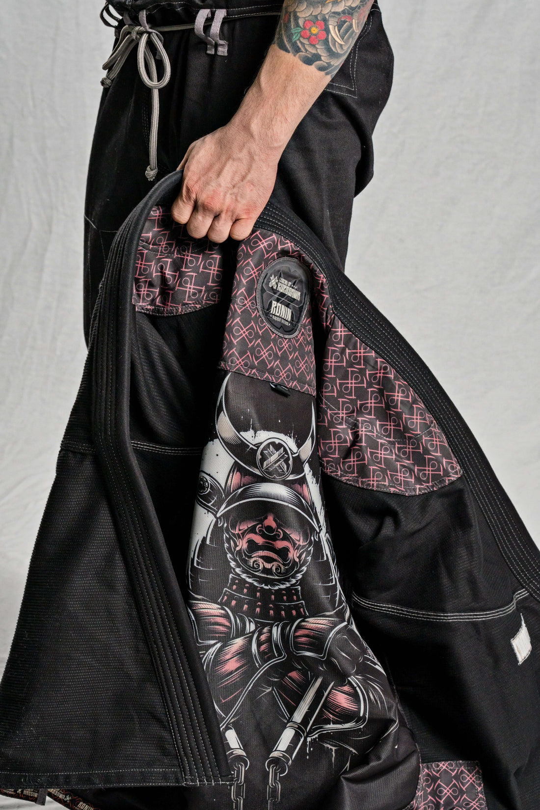 Fight gear featuring an intricate graphic design on the inside lining of a jiu-jitsu gi.