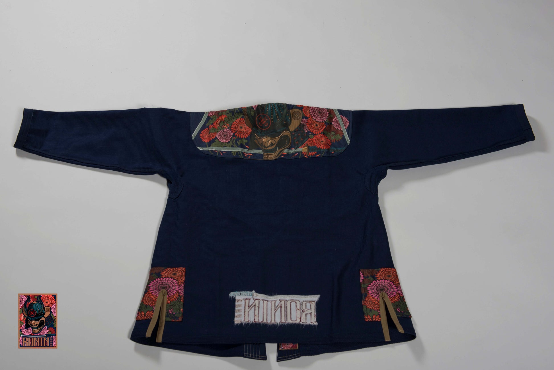 Roninbrand Emperor BJJ Gi in navy with intricate design, optimized for grappling and comfort in Brazilian Jiu Jitsu.