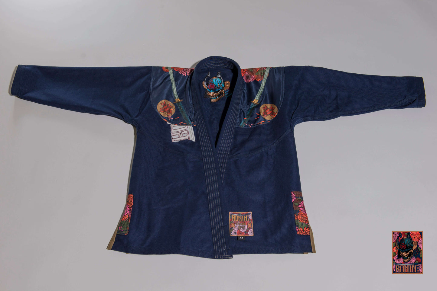 Roninbrand Emperor BJJ Gi in navy with intricate designs, made for comfort and optimal grappling performance.