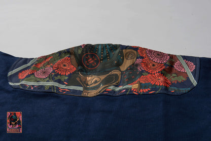 Emperor BJJ Gi Navy detail showcasing vibrant artwork and floral design, designed for comfort and grappling excellence.