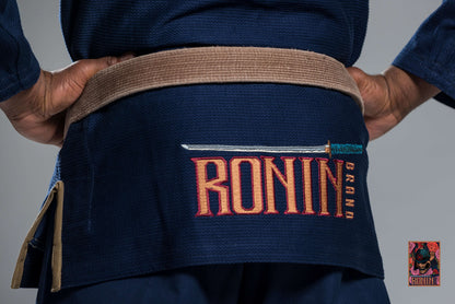 Roninbrand Navy Emperor BJJ Gi showcasing the embroidered logo and belt, designed for optimal comfort and performance in Brazilian Jiu Jitsu.
