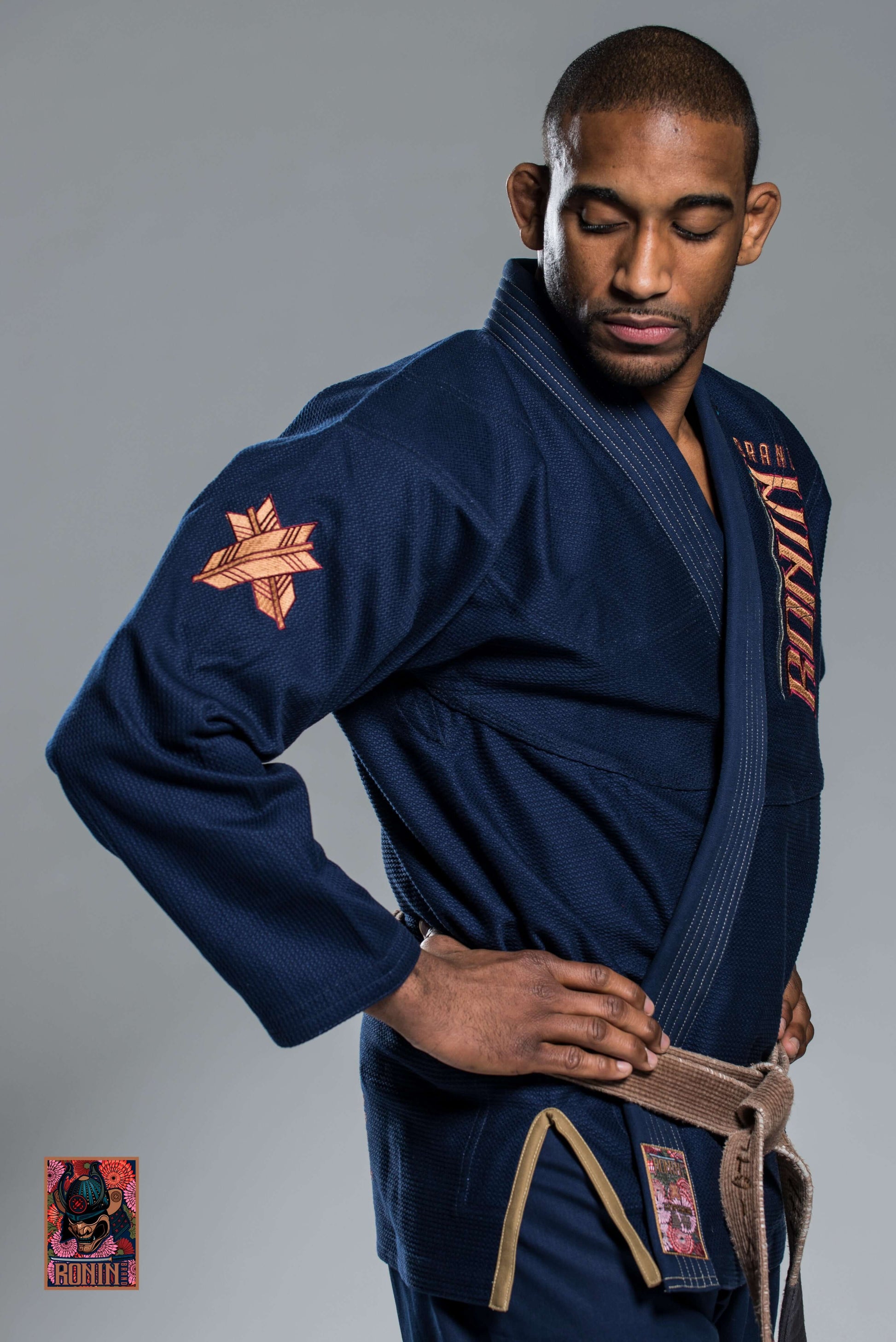 Model wearing Roninbrand Navy Emperor BJJ Gi showcasing comfort and style for Brazilian Jiu Jitsu combat.