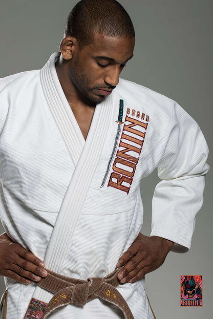 BJJ Gi Paragon Elite Fight x Ronin Emperor - White (Imperial Break) worn by a practitioner showing brand logo.