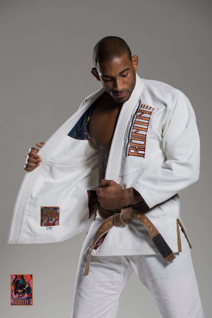 Roninbrand Emperor BJJ Gi in white worn by a martial artist showcasing comfort and style for Brazilian Jiu Jitsu.
