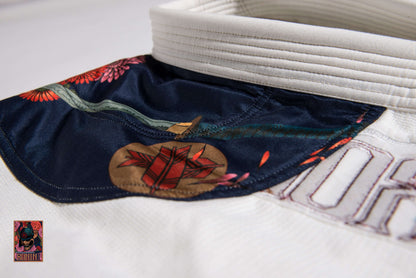 BJJ Gi Paragon Elite Fight x Ronin Emperor - White (Imperial Break) collar detail with floral design and emblem.