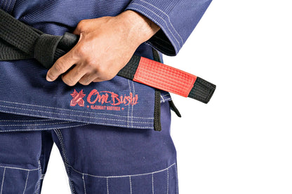 Roninbrand Oni Bushi BJJ Gi in navy with red and black belt, designed for elite Brazilian Jiu Jitsu performance.