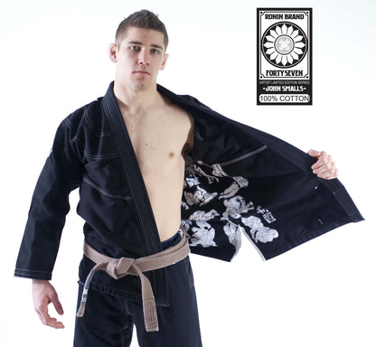 Model wearing Roninbrand 47 BJJ Gi in black, showcasing design and comfort—ideal for Brazilian Jiu Jitsu fighters.