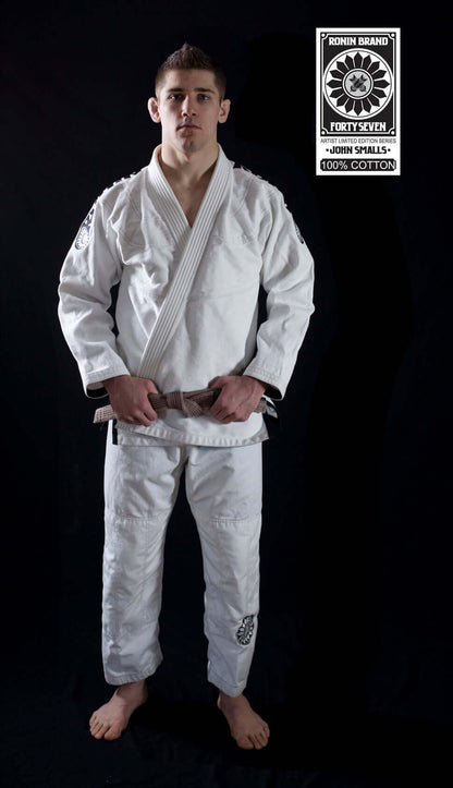 Male model wearing Roninbrand 47 BJJ Gi in white, showcasing comfort and fit for Brazilian Jiu Jitsu.