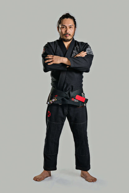 Roninbrand Samurai Ghost Black BJJ Gi worn by a fighter, showcasing professional fit and design for Brazilian Jiu Jitsu.