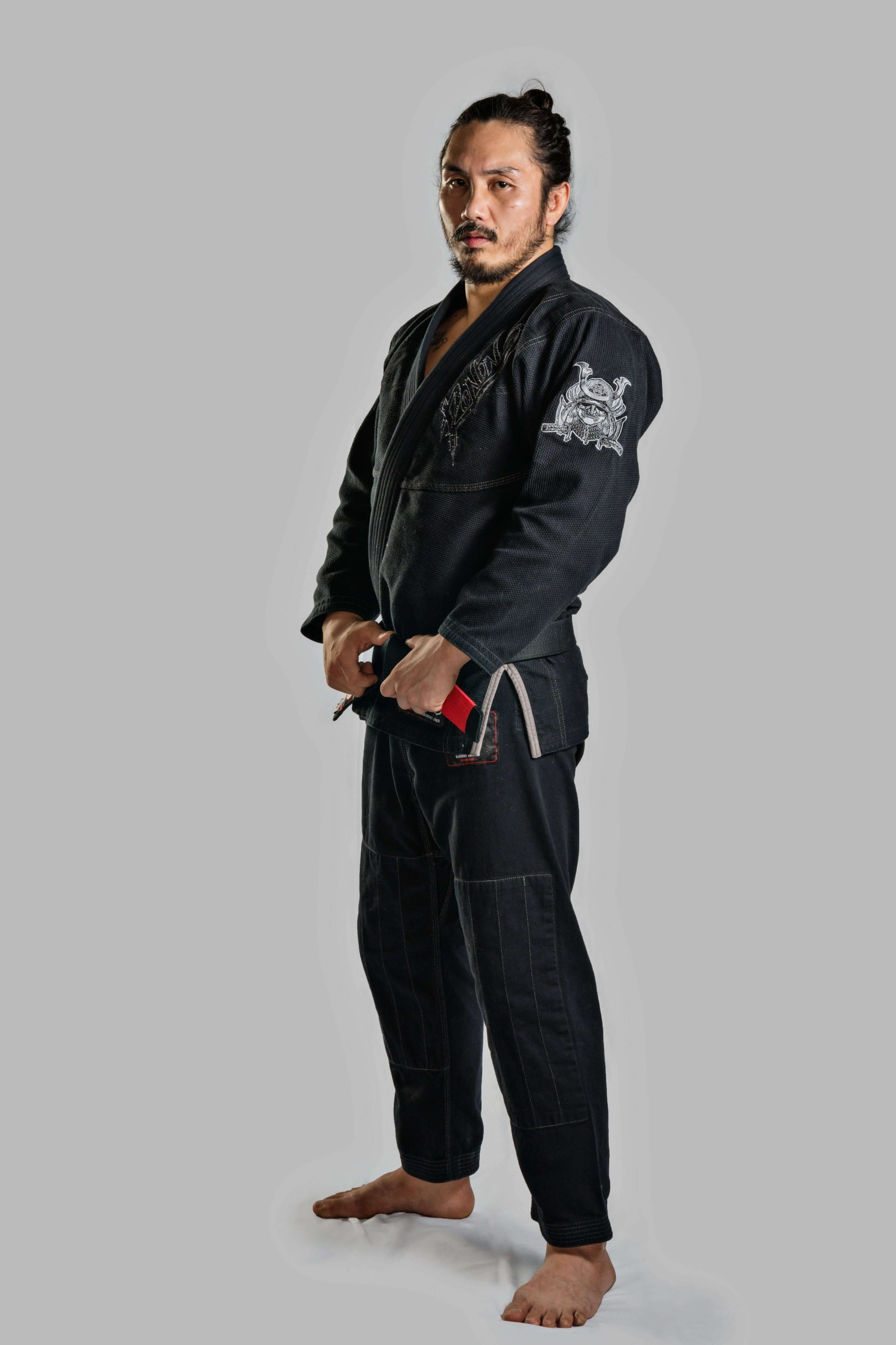 Roninbrand Samurai Ghost BJJ Gi in black, designed for elite Brazilian Jiu Jitsu practitioners, offers superior comfort and fit.