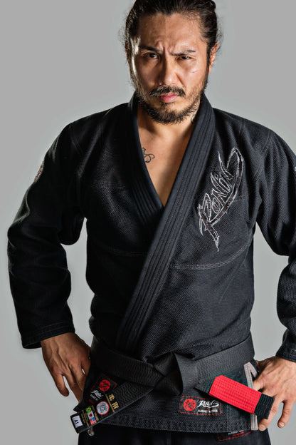 Man wearing Roninbrand Samurai Ghost BJJ Gi in black, showcasing professional Brazilian Jiu Jitsu gear designed for comfort and performance.