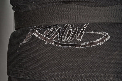 Close-up of Ronin logo on the black Samurai Ghost BJJ Gi, showcasing its quality and design for elite fighters.