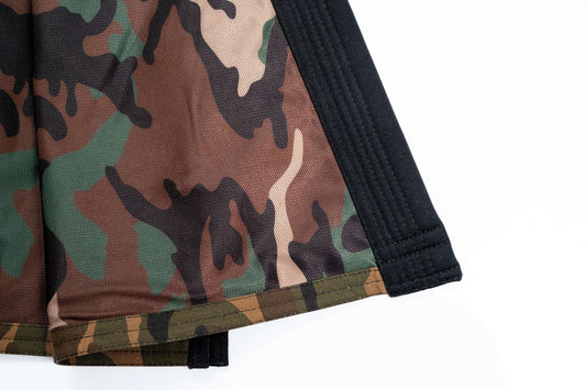 Roninbrand Camo BJJ Gi fabric detail showcasing green and brown camo pattern for optimal performance and comfort.