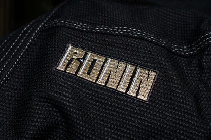 Close-up of the Ronin logo on the black Kurosawa BJJ Gi, symbolizing quality and tradition in Brazilian Jiu Jitsu.