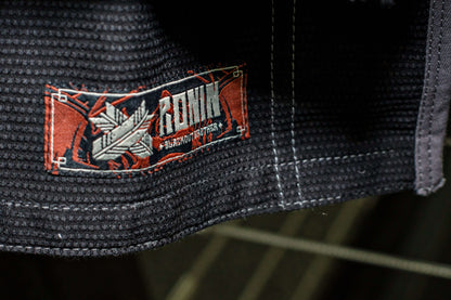 Roninbrand Kurosawa BJJ Gi label showcasing quality fabric and design for professional Brazilian Jiu Jitsu fighters.