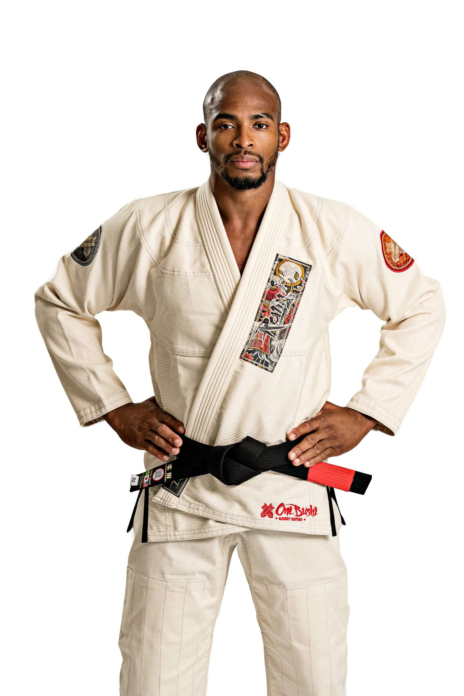 Model wearing Roninbrand Oni Bushi Unbleached BJJ Gi, showcasing comfort and grappling techniques for Brazilian Jiu Jitsu.