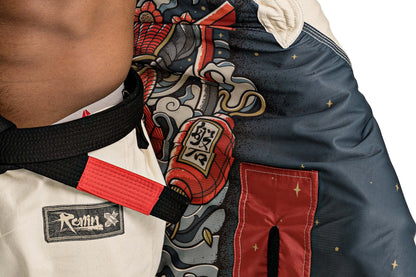 Detailed view of Roninbrand Oni Bushi BJJ Gi featuring intricate graphics and premium design for enhanced grappling performance.